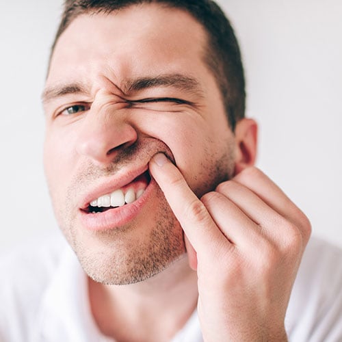 Young man isolated over white background